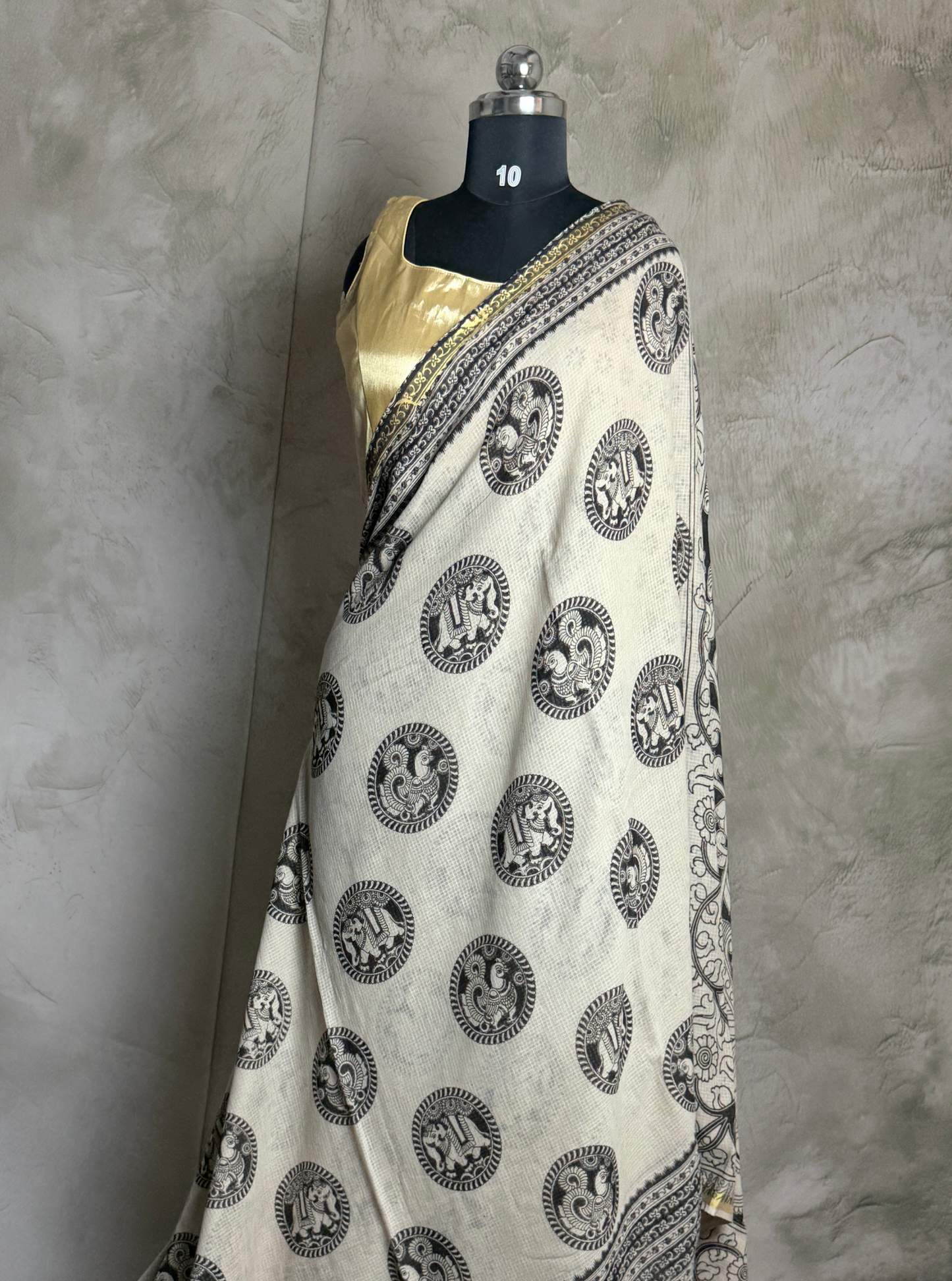 Ivory Kota Cotton Saree with Traditional Circular Motifs & Black Ethnic Border