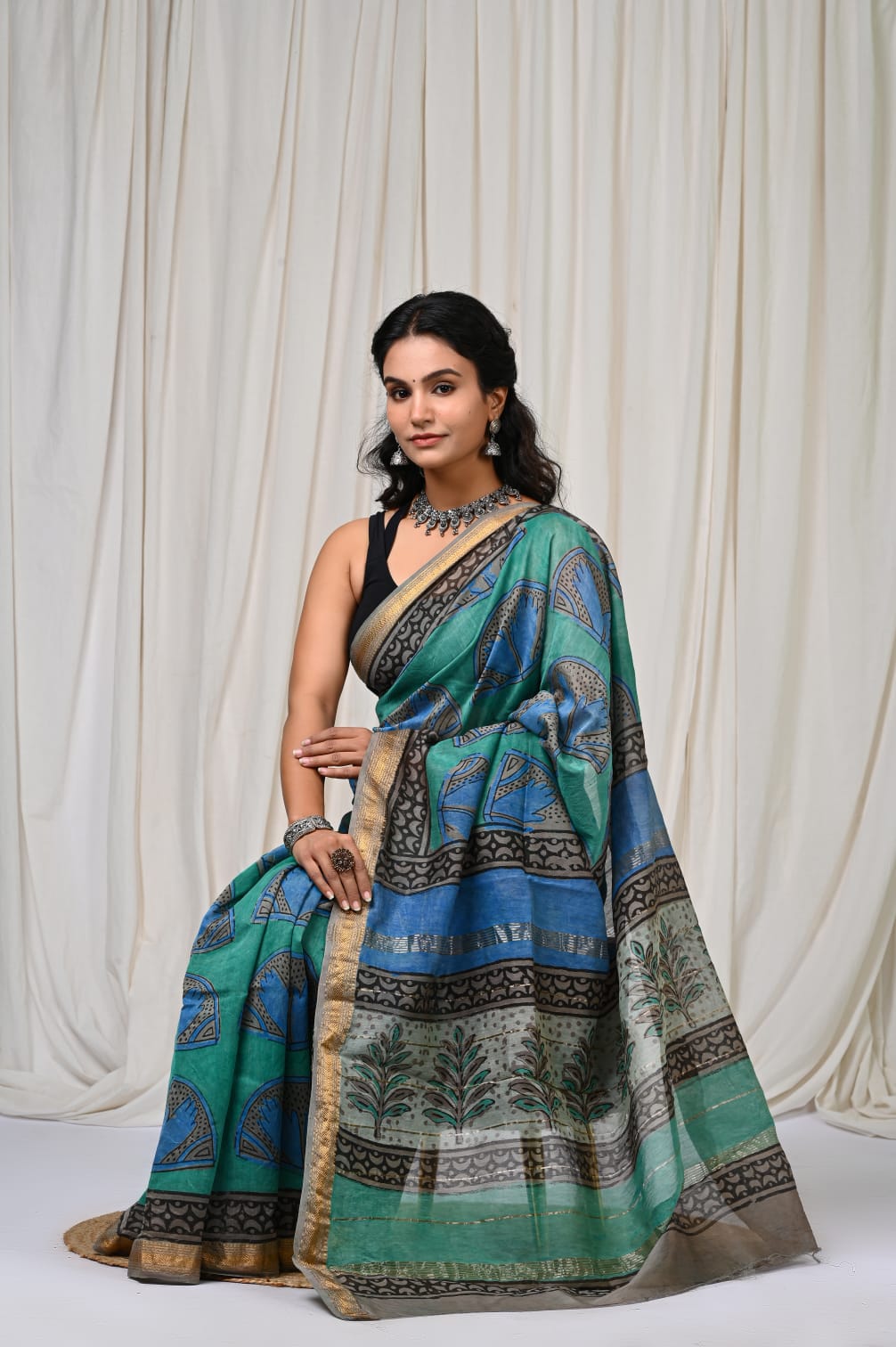 Teal Blue Maheshwari Silk Ajrakh Saree – Green Pallu & Gold Border