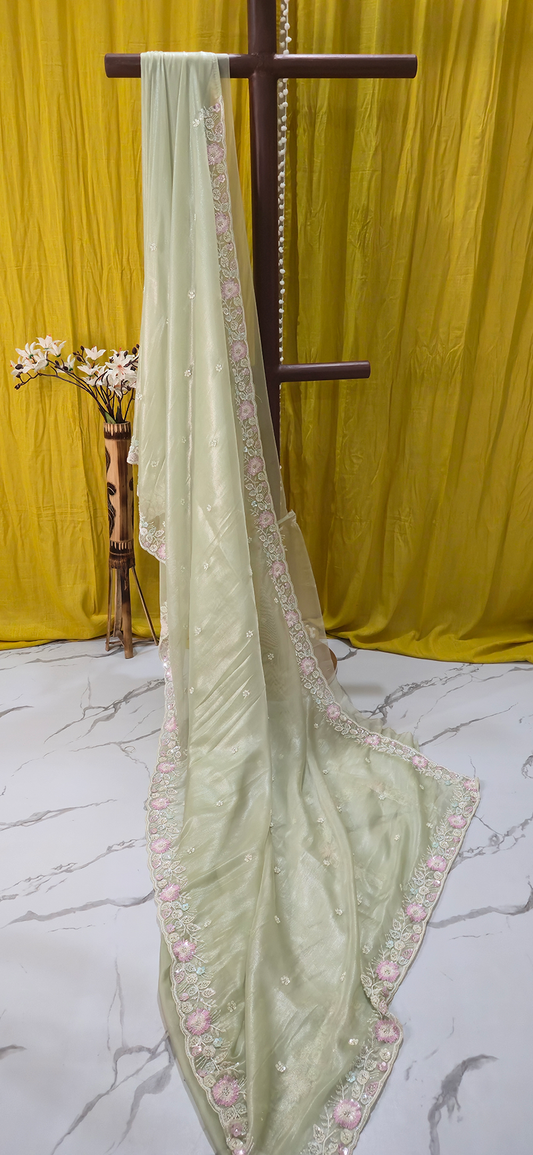 Stunning Pastel Green Net Saree with Heavy Hand Work for Festive and Party Wear
