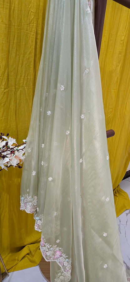 Stunning Pastel Green Net Saree with Heavy Hand Work for Festive and Party Wear