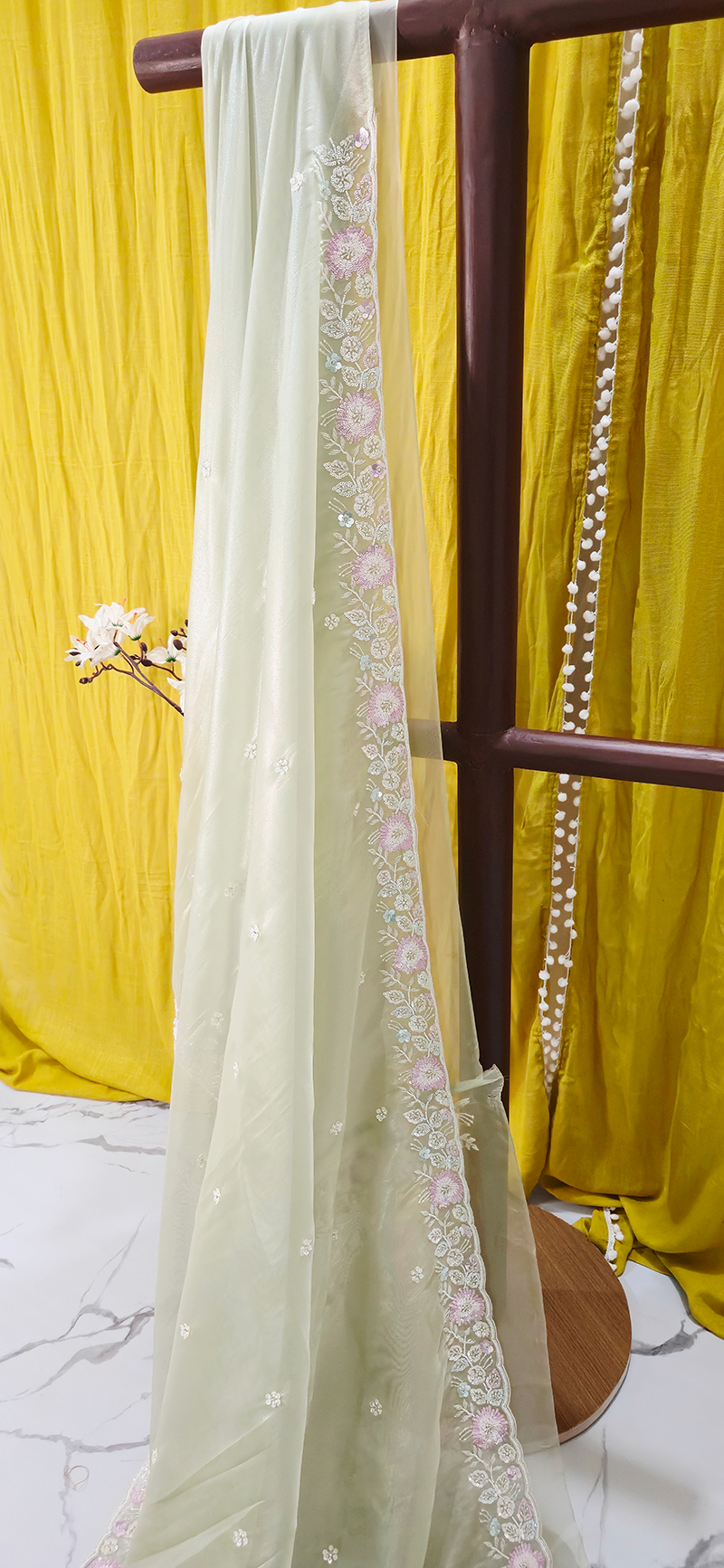 Stunning Pastel Green Net Saree with Heavy Hand Work for Festive and Party Wear