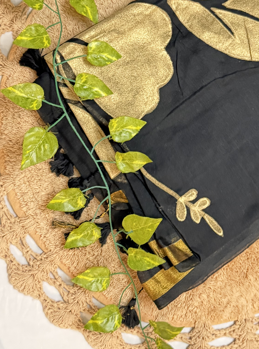 Midnight Black Mul Cotton Saree with Golden Leaf Design & Tassels