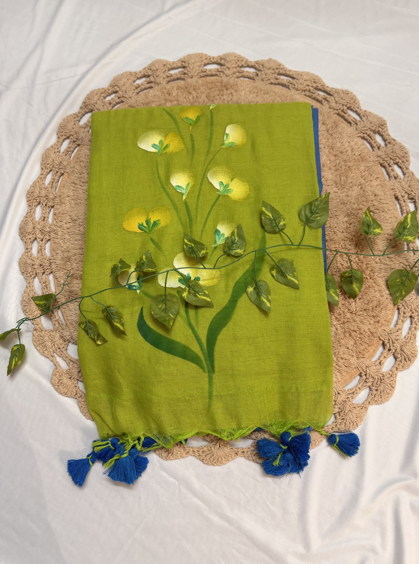 Refreshing Lime Green Hand-Painted Mul Cotton Saree with Floral Art & Blue Tassels