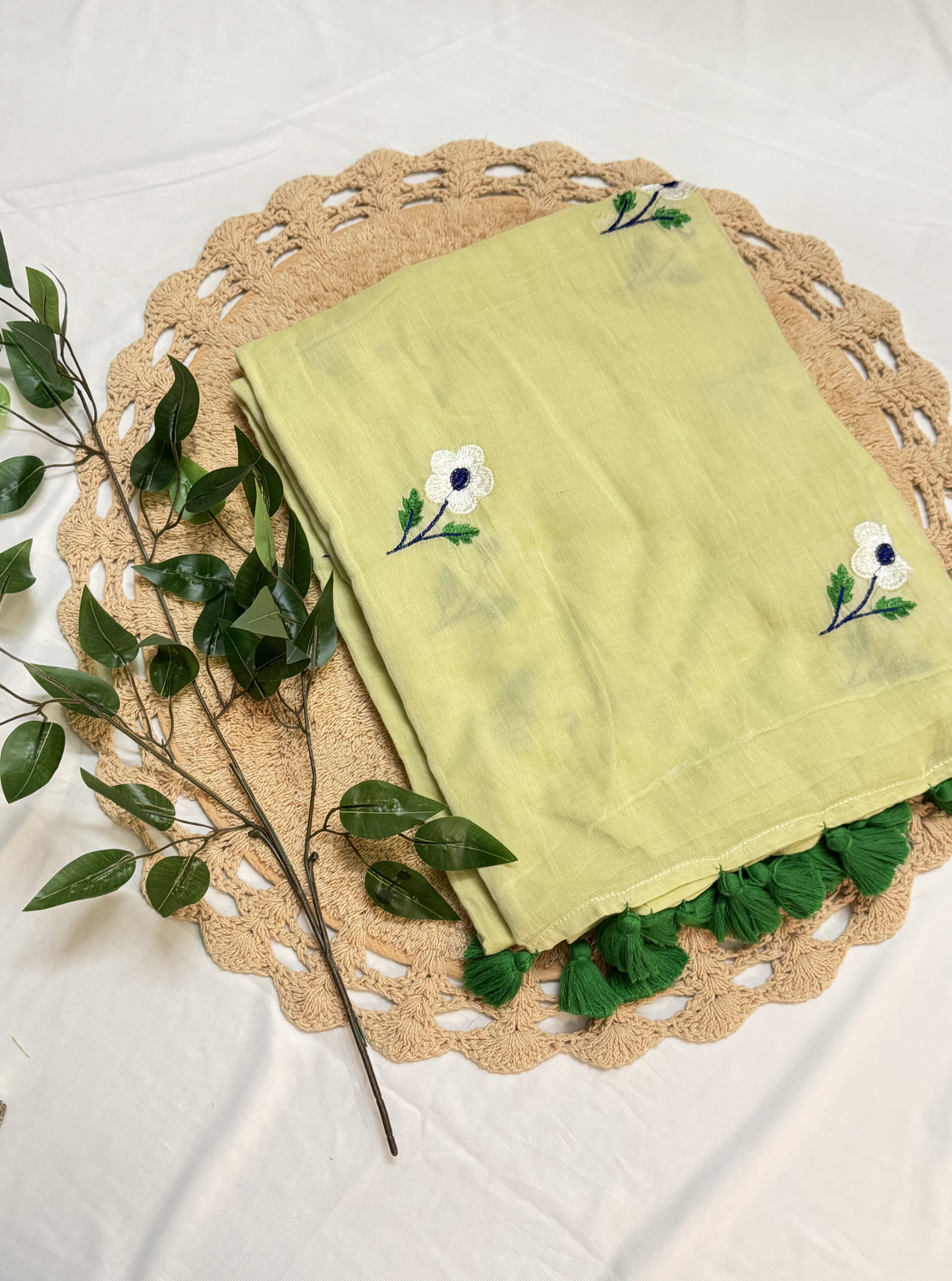 Lemon Yellow Mul Cotton Saree with Floral Butti & Green Tassels