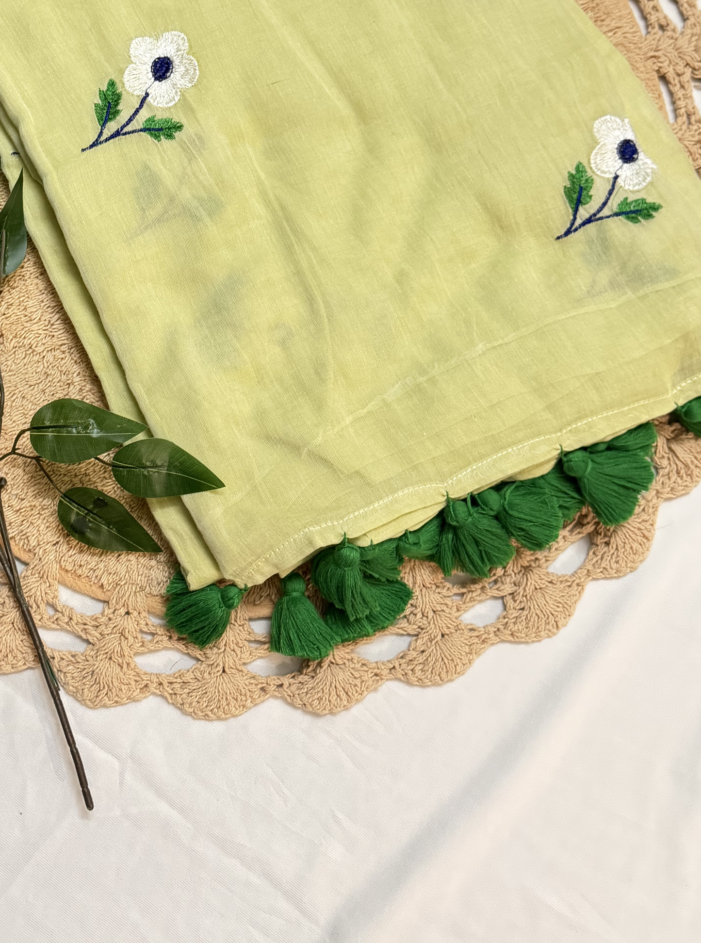 Lemon Yellow Mul Cotton Saree with Floral Butti & Green Tassels