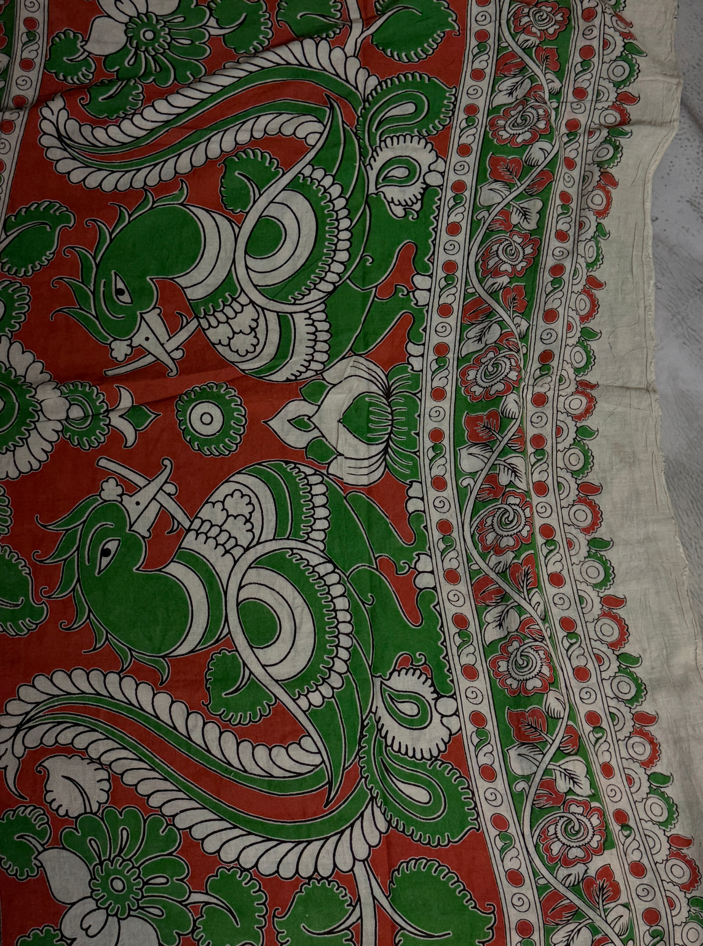 Rust Orange Cotton Kalamkari Saree with Leaf Motifs & Green Border