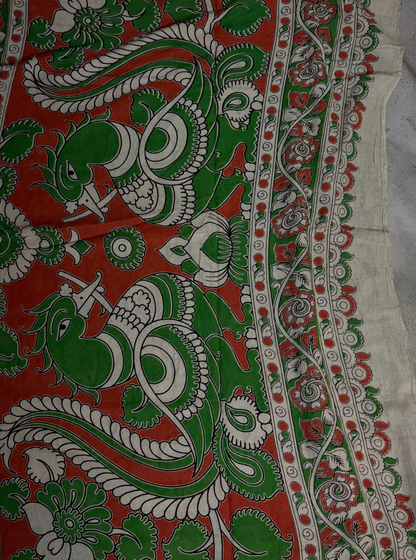 Rust Orange Cotton Kalamkari Saree with Leaf Motifs & Green Border