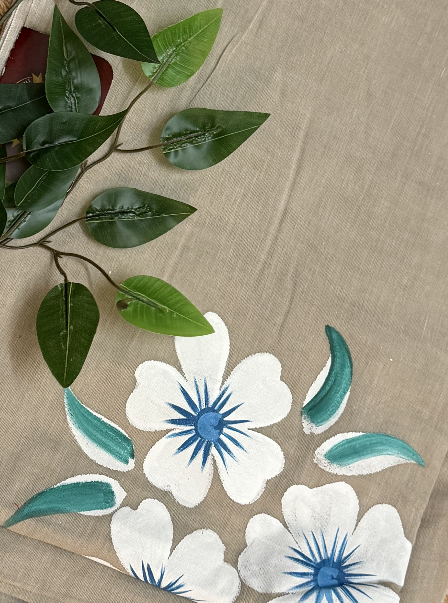 Beige Mul Cotton Saree with Hand-Painted White & Blue Floral Design & Contrast Tassels