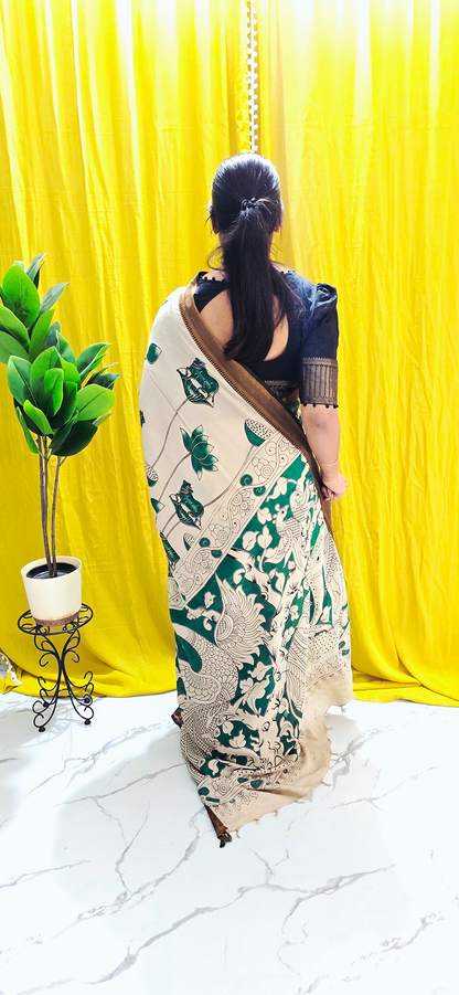 Charming Dark Green Kalamkari Mangalagiri Silk Saree with Nizam Border and Hand Block Design