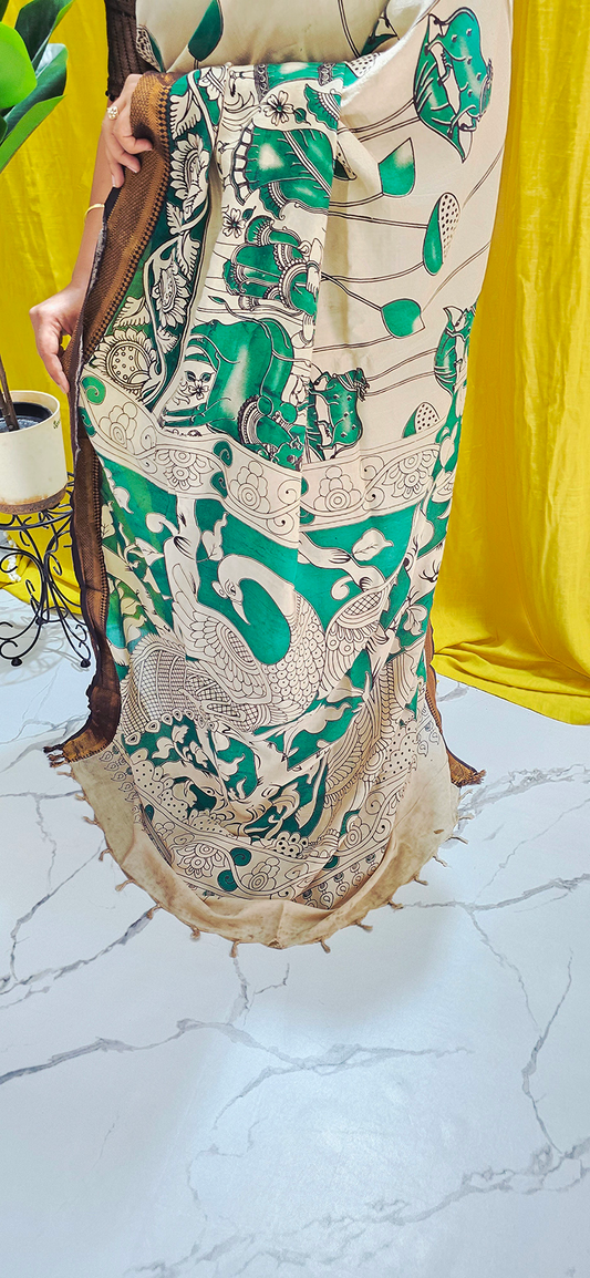 Charming Dark Green Kalamkari Mangalagiri Silk Saree with Nizam Border and Hand Block Design