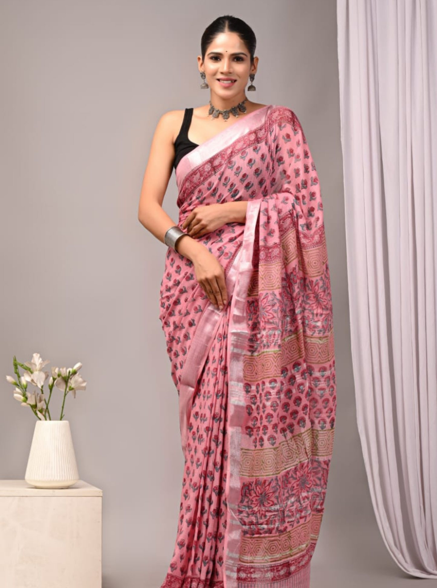 Elegant Pink Linen Cotton Saree with Traditional Floral Motifs