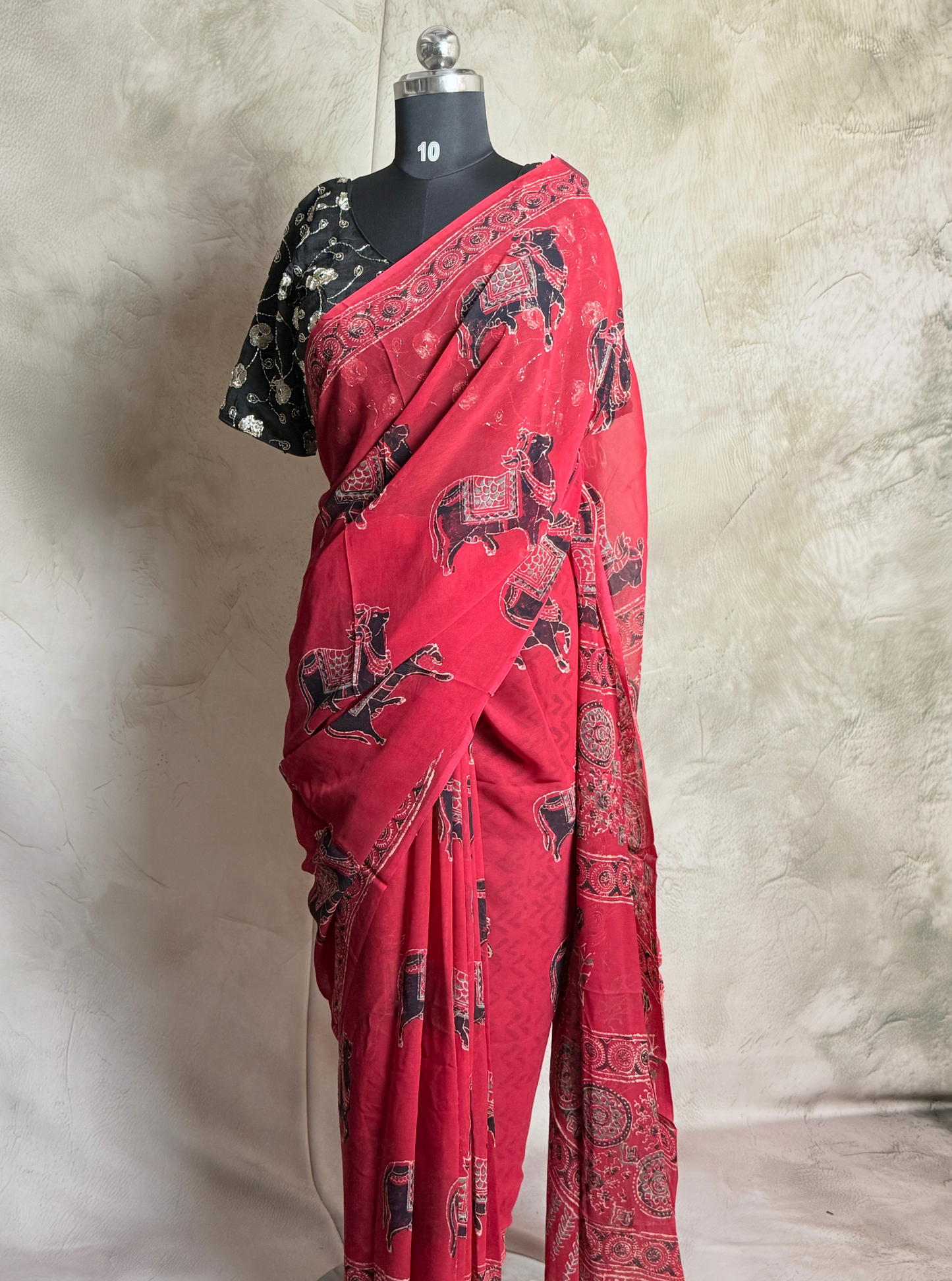 Rani Pink Chiffon Saree with Traditional Elephant Motifs