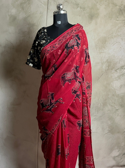Rani Pink Chiffon Saree with Traditional Elephant Motifs