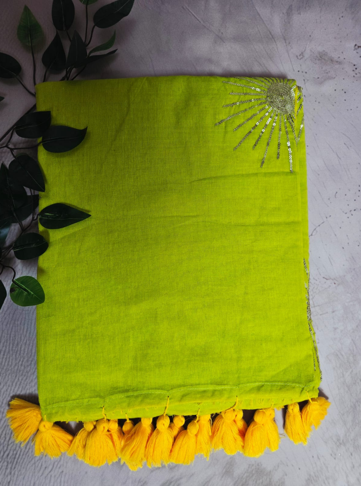 Lime Yellow Mul Cotton Saree with Hand Embellished Sun Motif