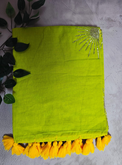 Lime Yellow Mul Cotton Saree with Hand Embellished Sun Motif