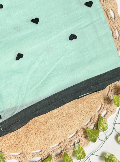 Mint Green Mul Cotton Saree with Black Heart Motifs & Tassels