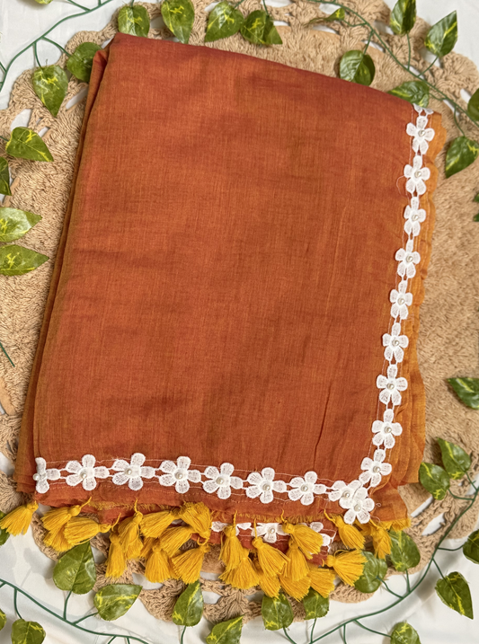 Rust Orange Mul Cotton Saree with White Floral Lace Border & Contrast Tassels