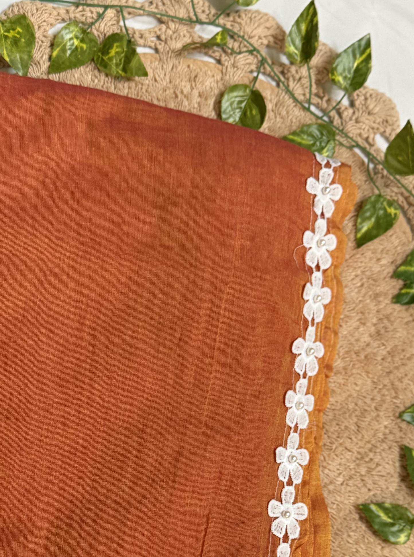 Rust Orange Mul Cotton Saree with White Floral Lace Border & Contrast Tassels