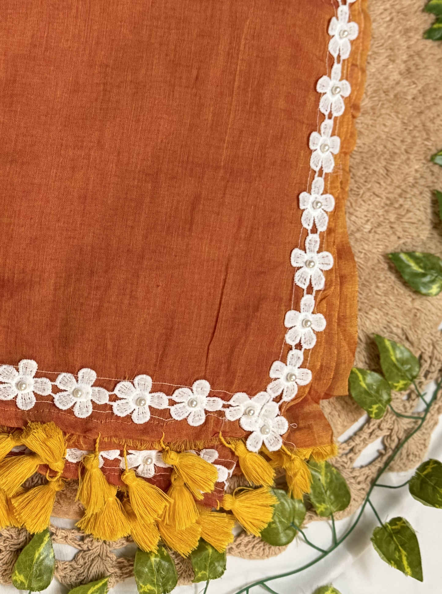 Rust Orange Mul Cotton Saree with White Floral Lace Border & Contrast Tassels
