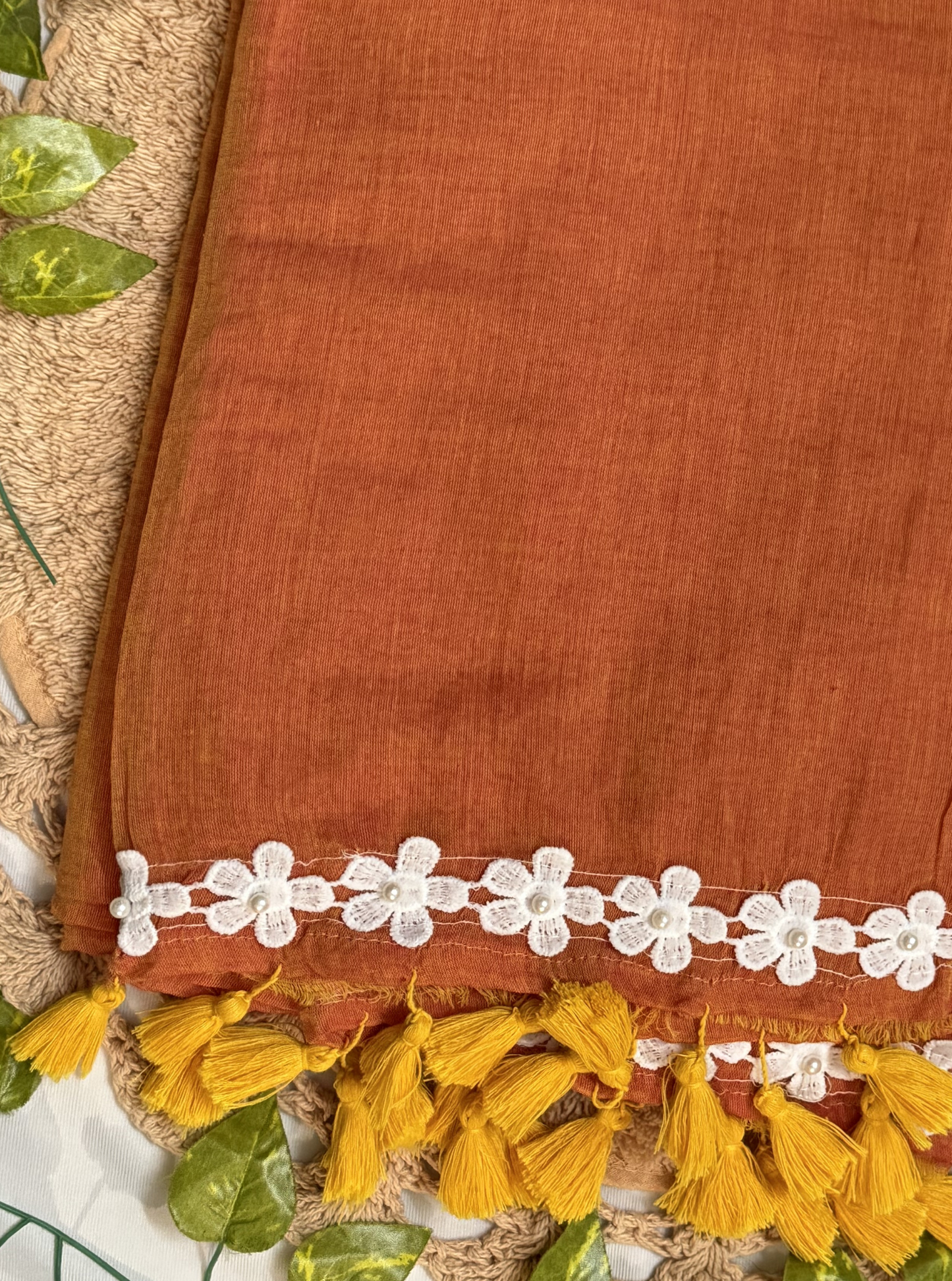 Rust Orange Mul Cotton Saree with White Floral Lace Border & Contrast Tassels