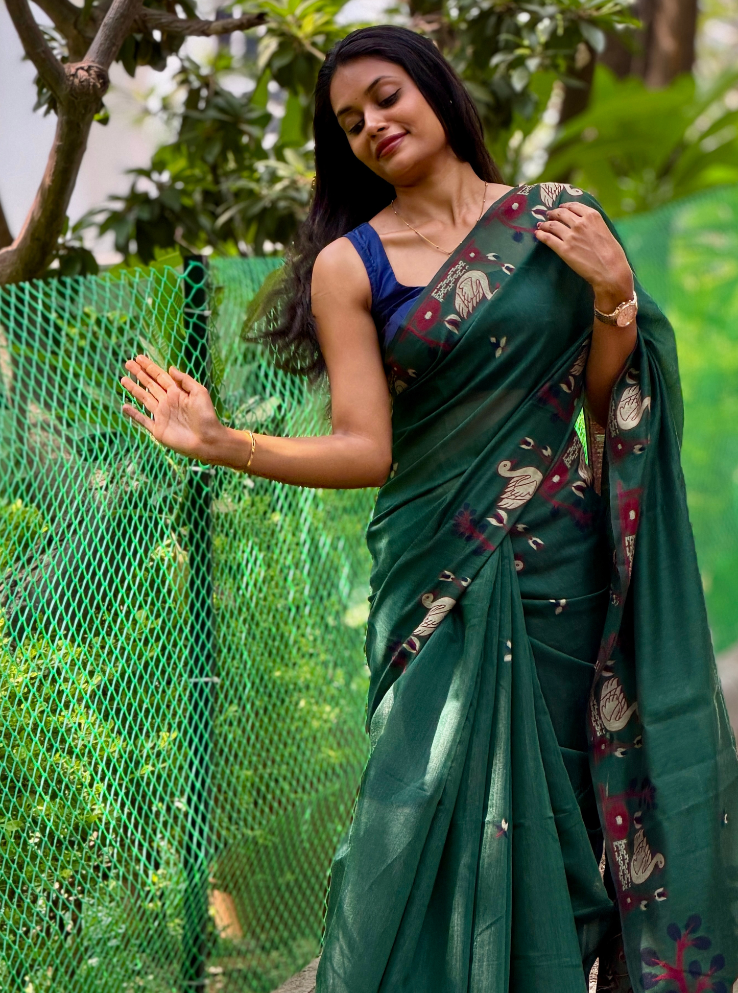 Elegant Forest Green Cotton Designer Saree with Artistic Border
