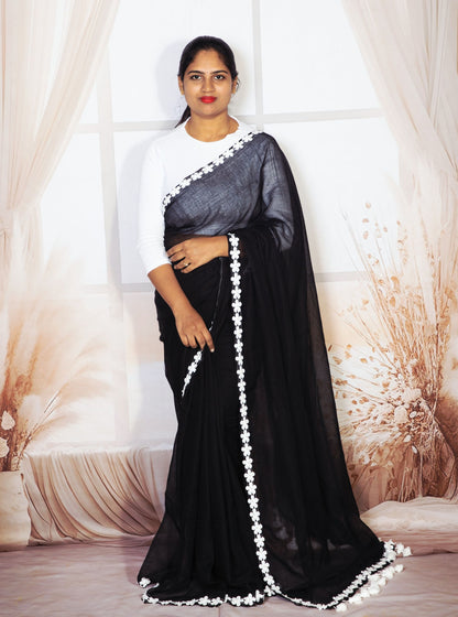 Elegant Black Mul Cotton Saree with White Floral Lace Border
