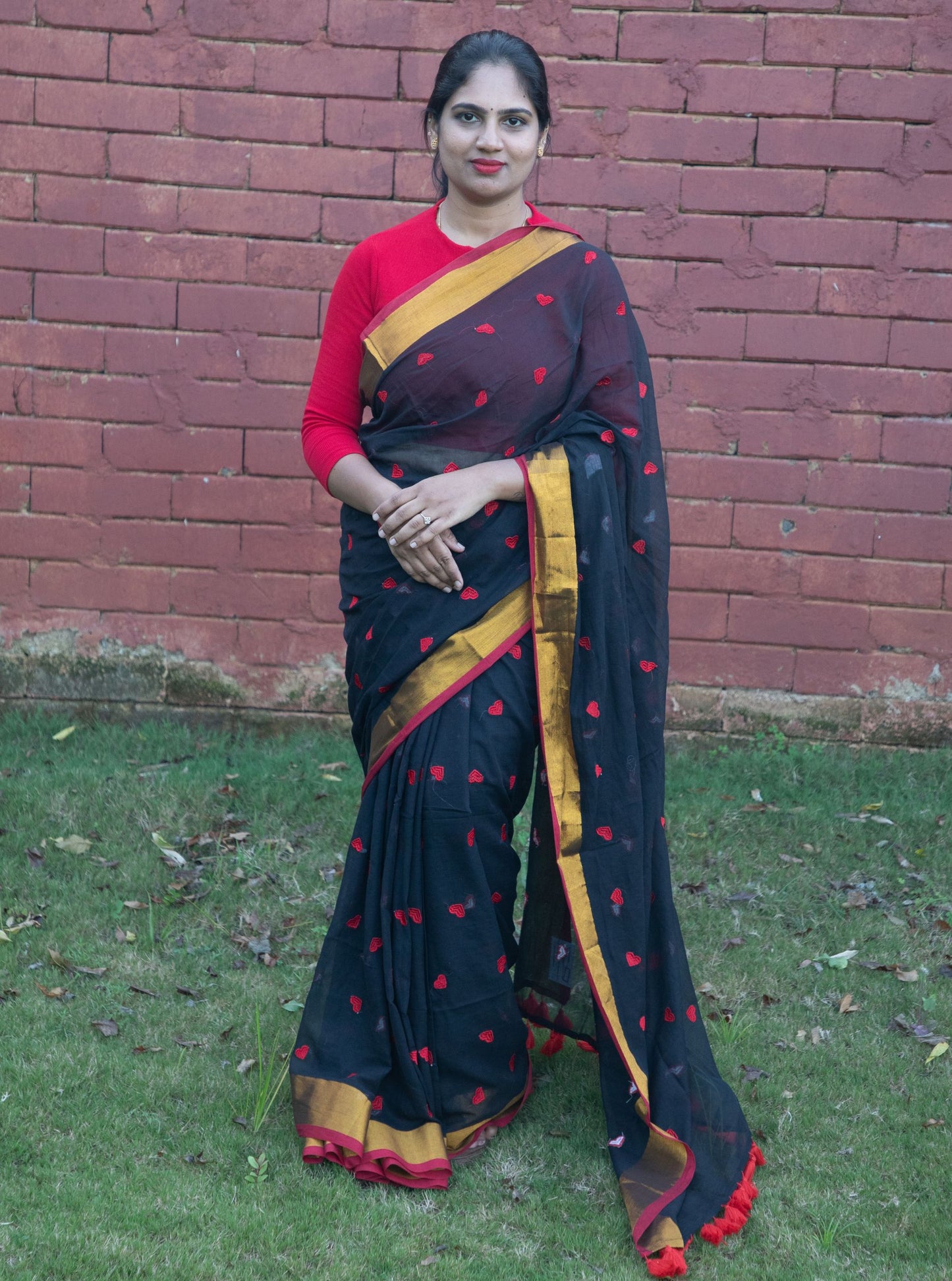 Black Mul Cotton Saree with Red Heart Motifs & Golden Zari Border
