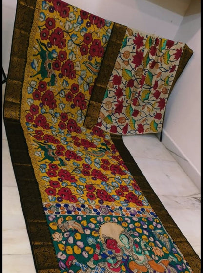 Mustard Yellow Pen Kalamkari Saree with Mythological Story Panel & Floral Motifs