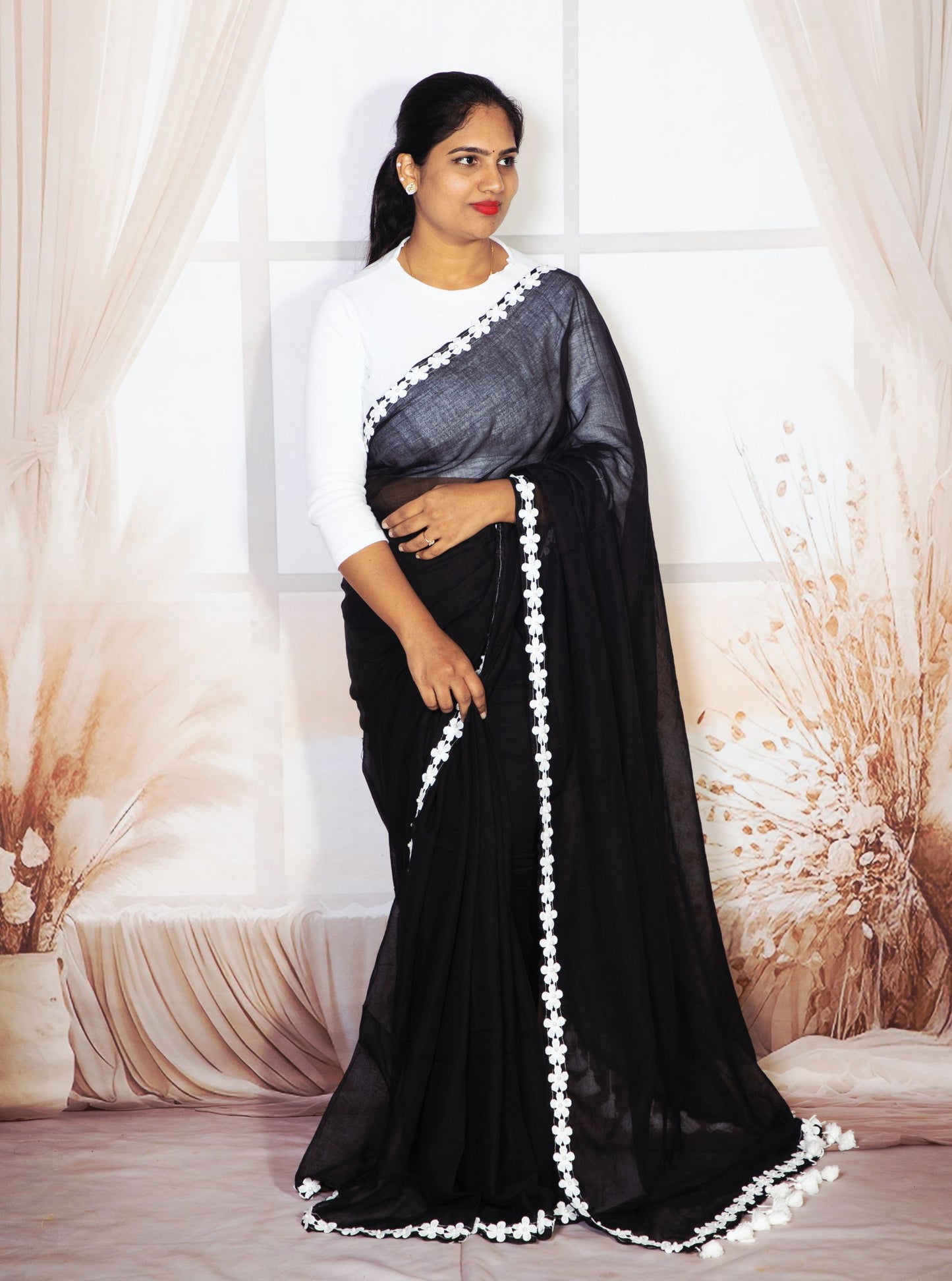 Elegant Black Mul Cotton Saree with White Floral Lace Border