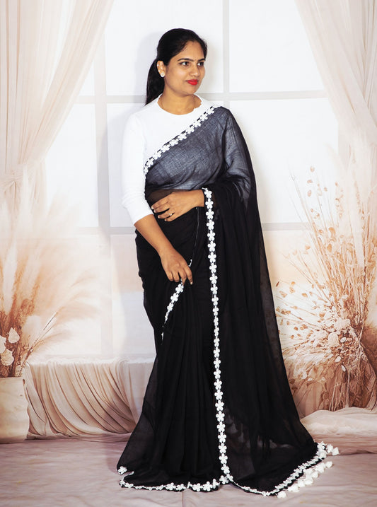Elegant Black Mul Cotton Saree with White Floral Lace Border