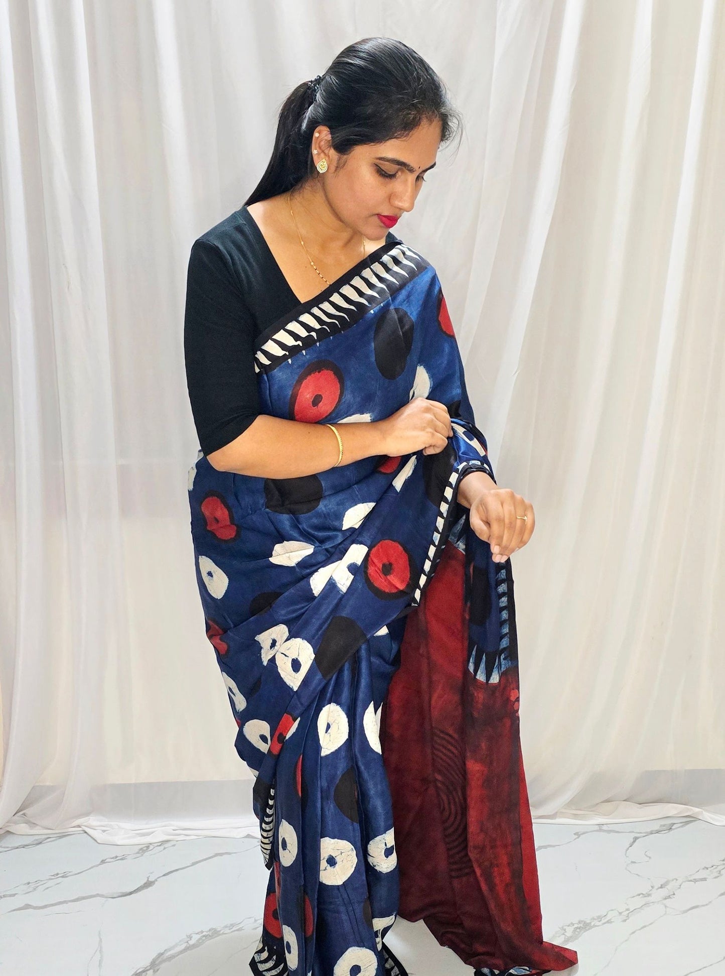 Rust Red & Indigo Pure Modal Silk Saree with Abstract Circular Motifs & Contrast Border