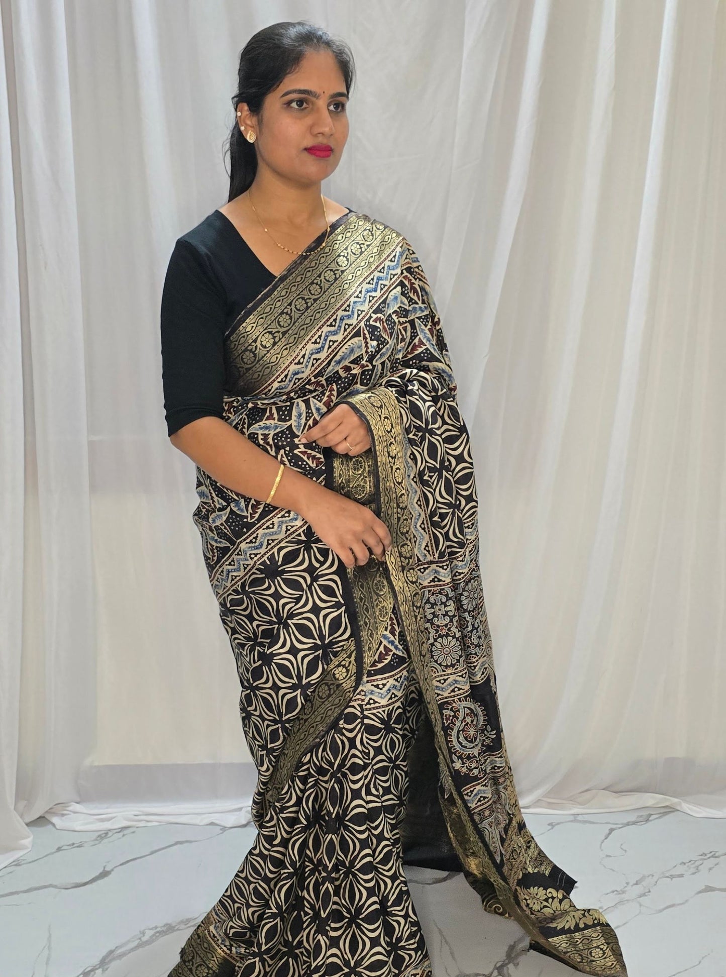 Classic Black Dola Silk Saree with Traditional Ajrakh Print & Antique Gold Border