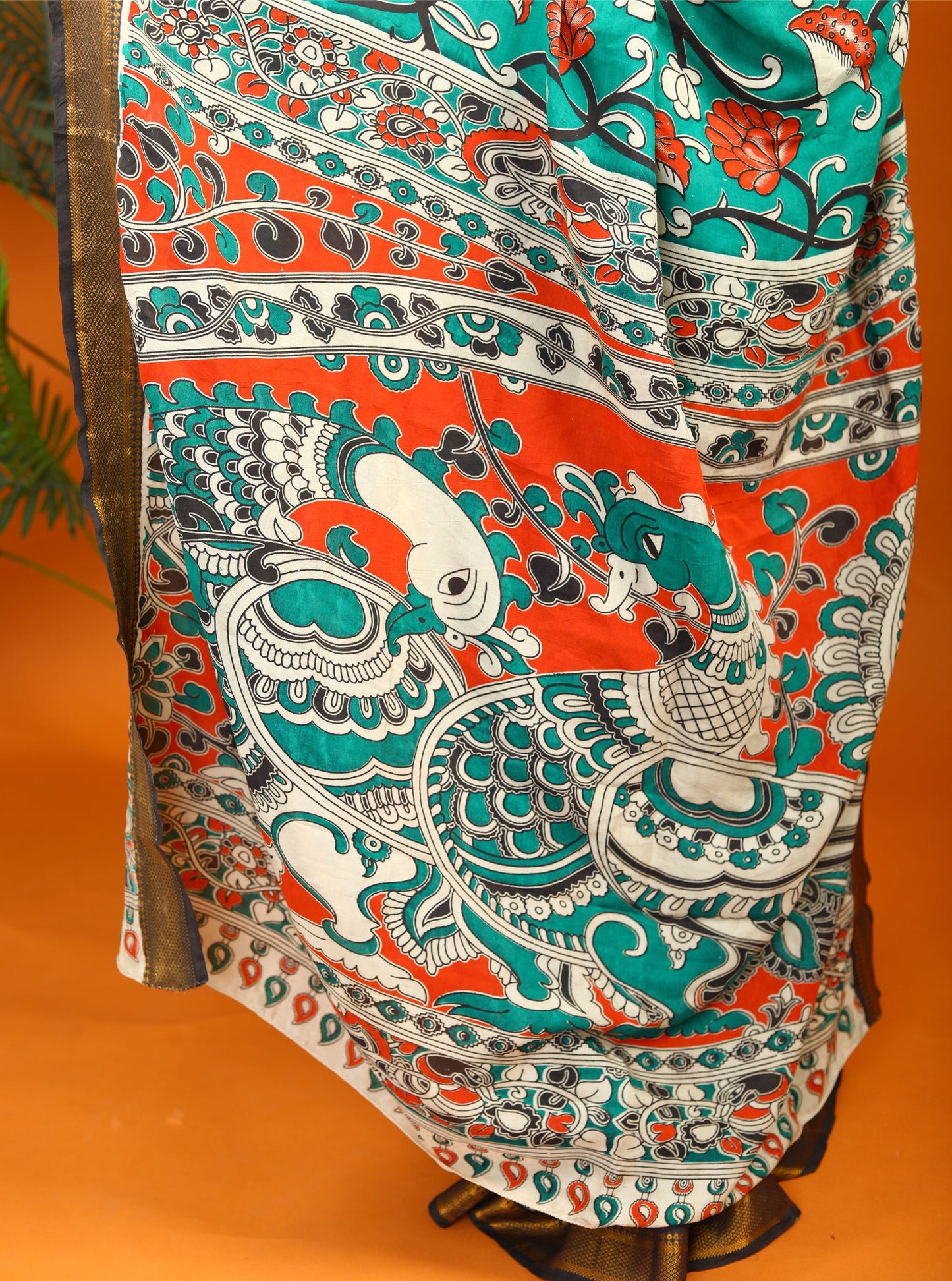 Teal Green Kalamkari Saree with Traditional Floral Print & Contrast Border