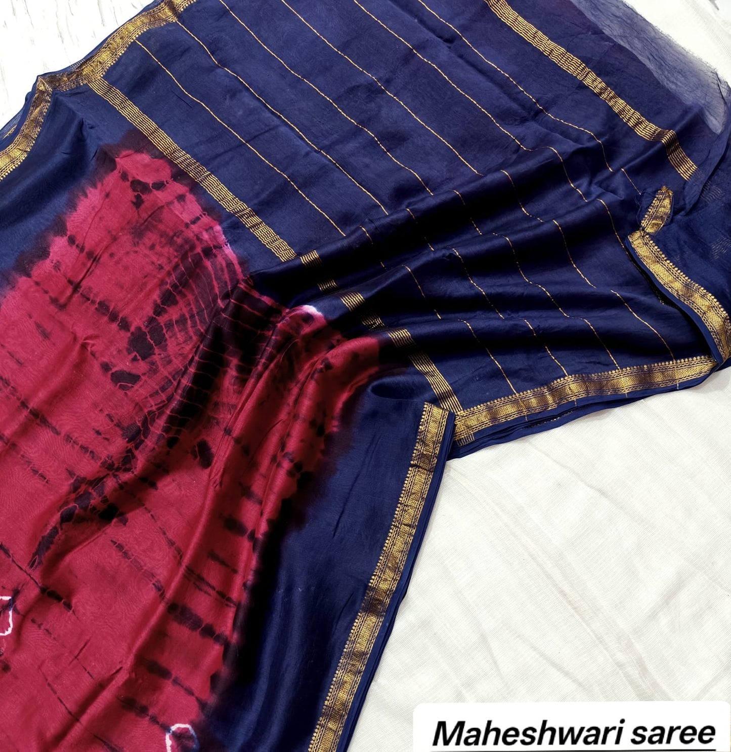 Navy Blue & Rani Pink Maheshwari Silk Saree with Ajrakh Pallu & Gold Zari Border