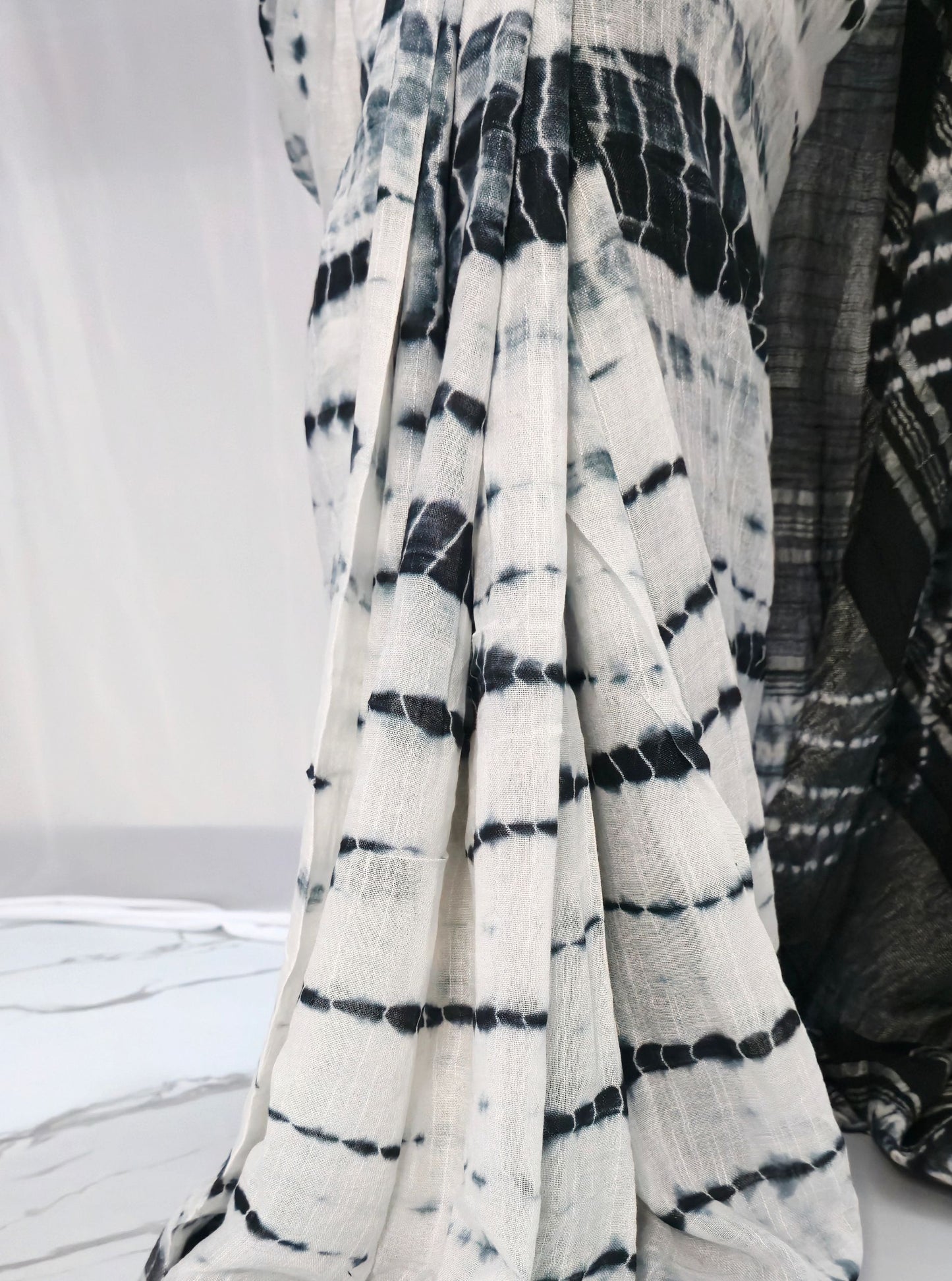 Ivory & Black Linen Cotton Saree with Shibori-Inspired Tie-Dye Patterns