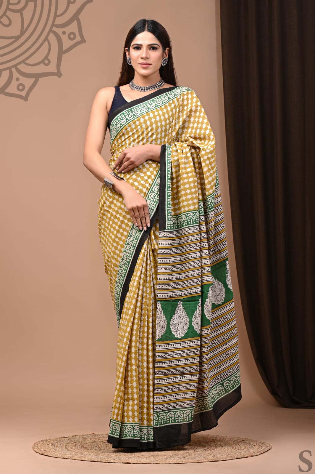 Mustard Yellow Cotton Ajrakh Saree with Green Border and Printed Pallu