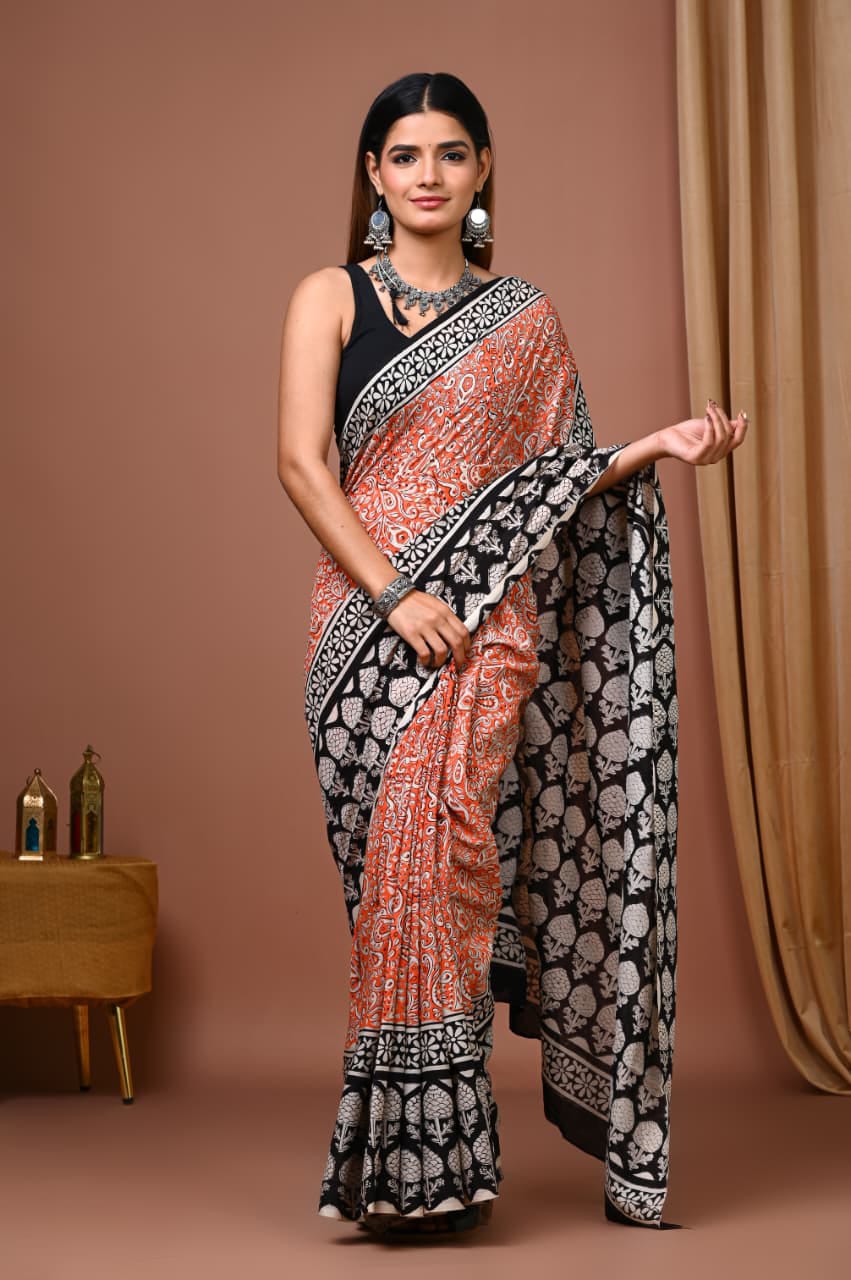 Rust Orange Cotton Ajrakh Saree with White Paisley Motifs and Black Pallu