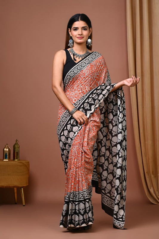 Rust Orange Cotton Ajrakh Saree with White Paisley Motifs and Black Pallu
