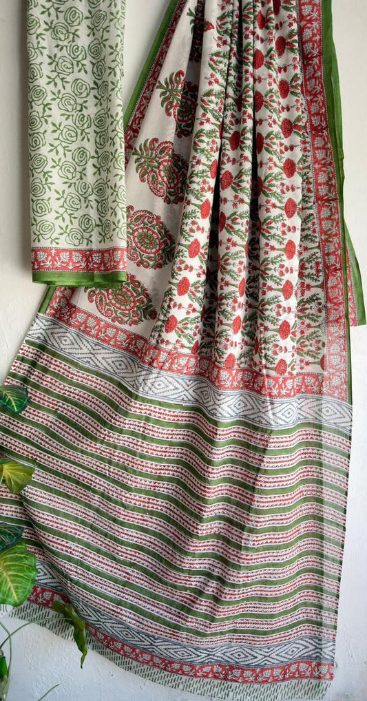 Cream saree with green floral prints, red decorative border and striped pallu