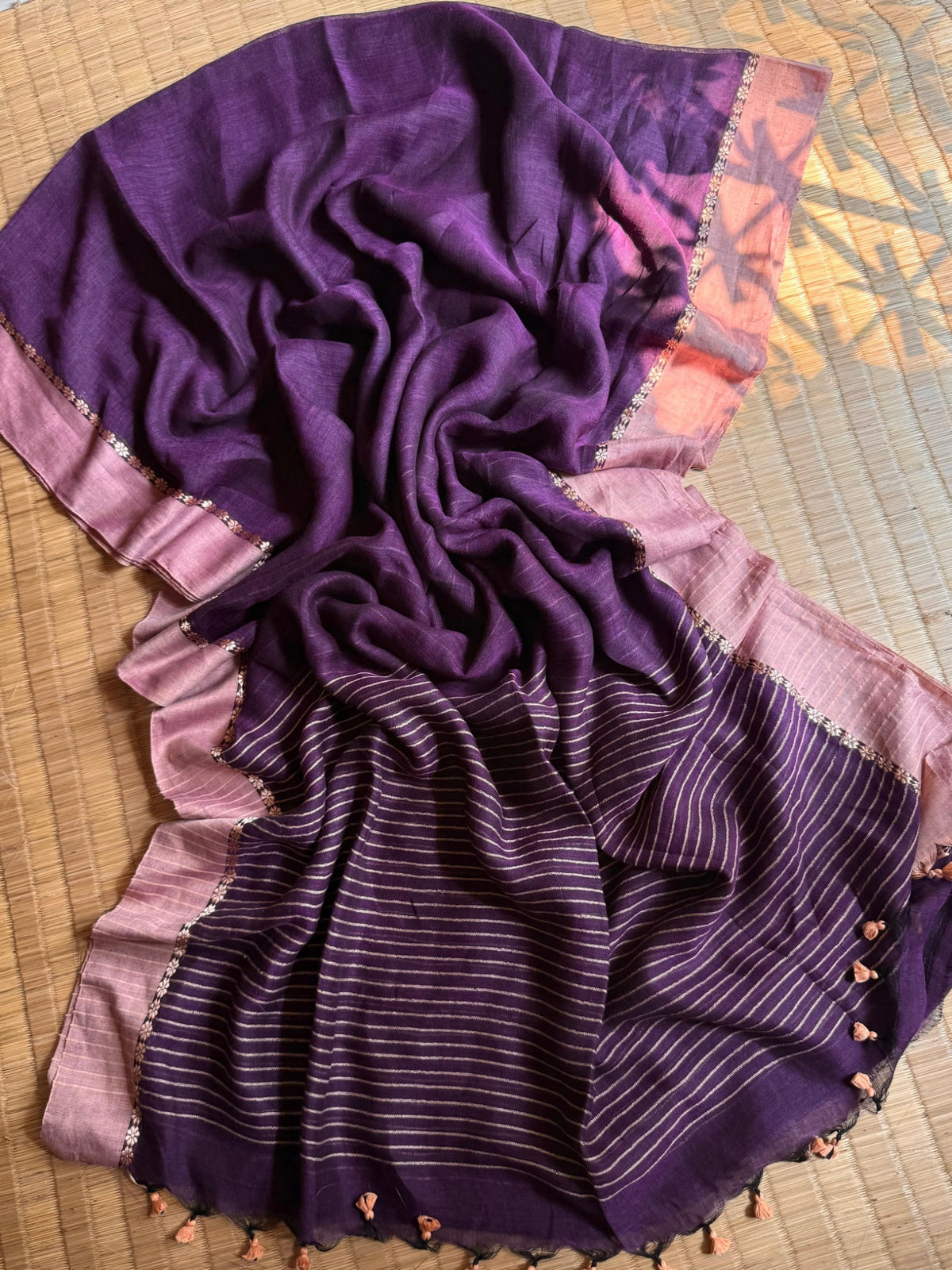 Deep purple linen cotton handloom saree with dusty rose border, striped pallu and tassels