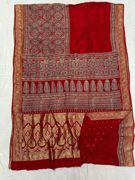 Mustard yellow Dola silk Ajrakh handblocked saree with multicolour geometric triangle pattern and gold border