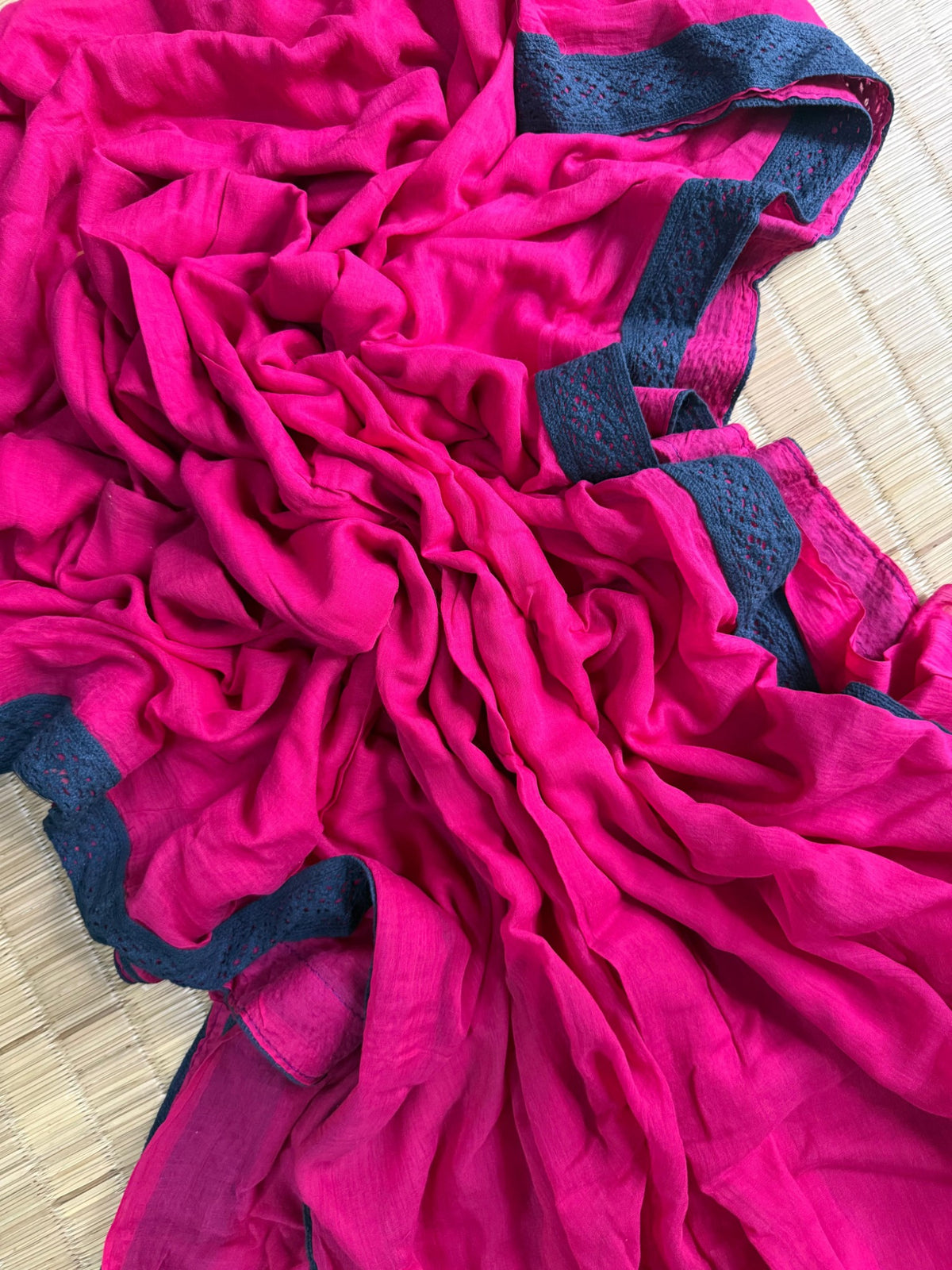 Fuchsia pink mul cotton saree with dark navy lace border
