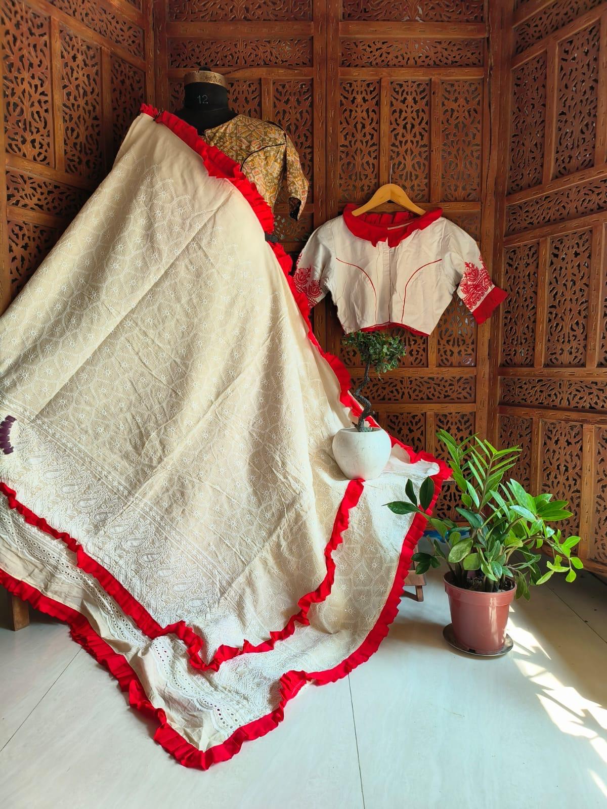 Ivory Hakoba mull cotton saree with red frill border and white blouse with red detailing