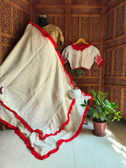Ivory Hakoba mull cotton saree with red frill border and white blouse with red detailing