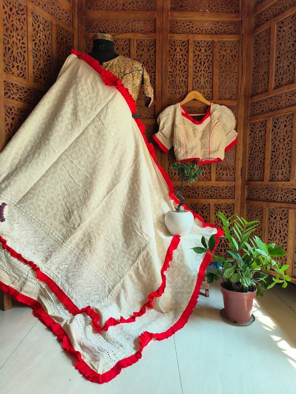 Ivory Hakoba mull cotton saree with red frill border and beige embroidered blouse