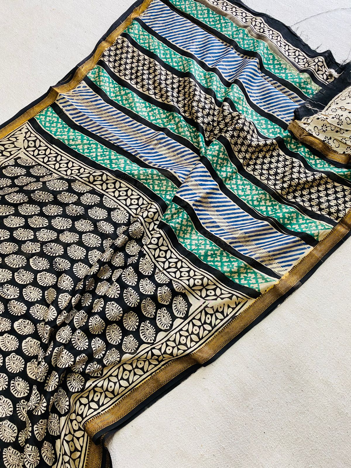 Black & Cream Maheshwari Silk Ajrakh Saree with Paisley Motifs, Blue-Green Striped Pallu and Gold Zari Border