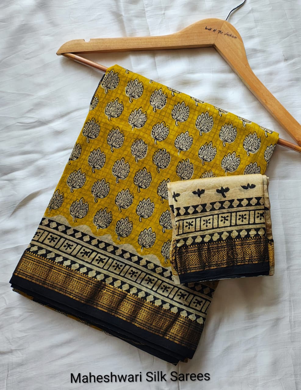 Mustard Yellow & Black Maheshwari Silk Ajrakh Saree with Lotus Motifs and Gold Zari Border