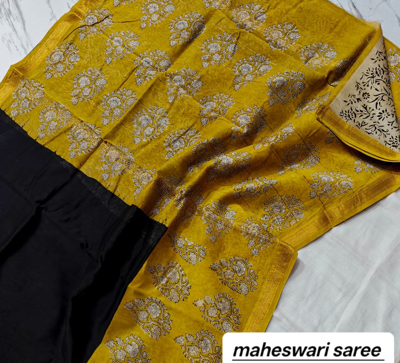 Mustard Yellow & Black Maheshwari Silk Saree with Floral Ajrakh Pallu & Gold Zari Border