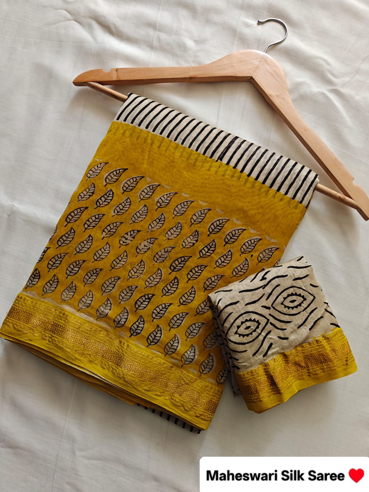 Mustard Yellow & Cream Maheshwari Silk Saree with Leaf-Print Body, Black Abstract Pallu and Woven Zari Border