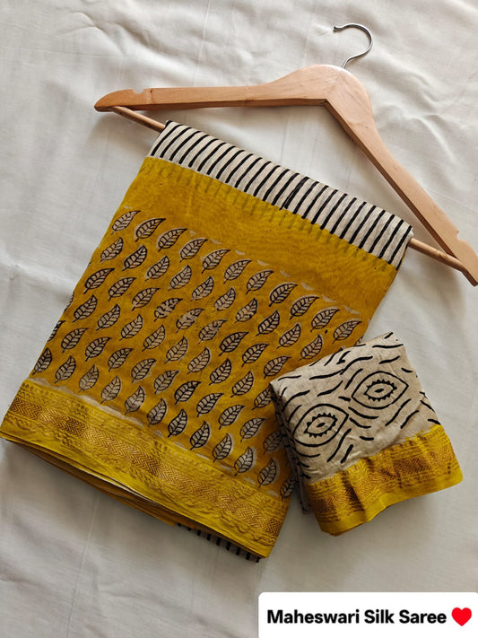 Mustard Yellow & Cream Maheshwari Silk Saree with Leaf-Print Body, Black Abstract Pallu and Woven Zari Border